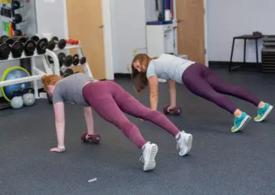 Personal Trainer working with a client